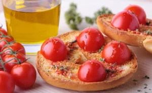 Tostada con AOVE y tomate